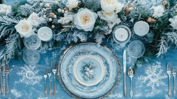 Fototapeta Icy blue and white table setting for a winter dinner party.