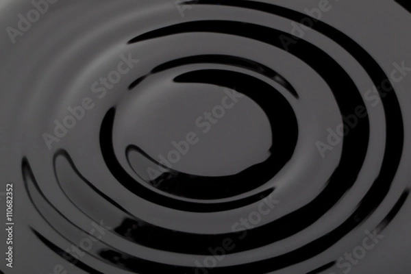 Obraz swirling black liquid
