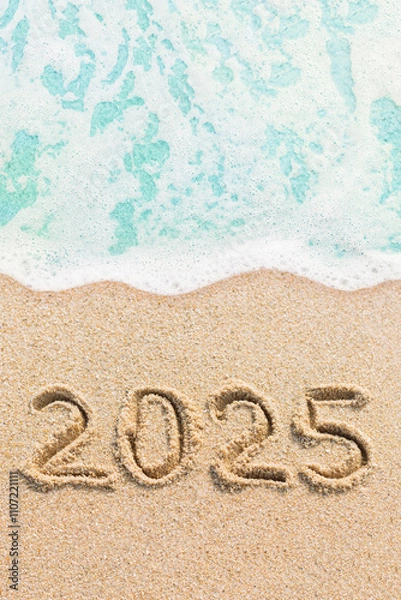 Fototapeta Numbers 2025 written on the beach. Happy new year and holidays travel concept photo