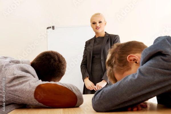 Fototapeta Two businessman sleeping on business presentation