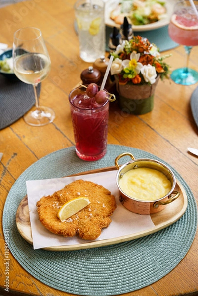Obraz Traditional schnitzel with potato puree and cucumber salad