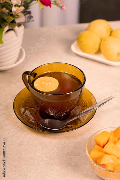 Obraz a glass of warm lemon tea