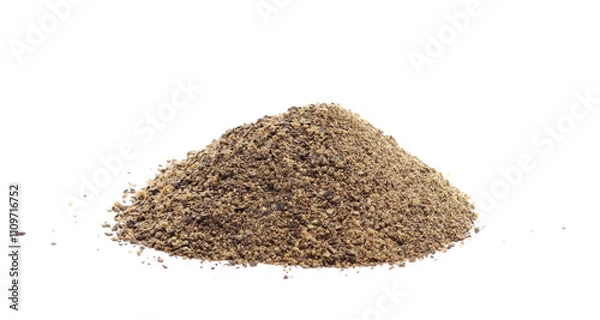 Fototapeta Minced black pepper, ground peppercorn pile isolated on white