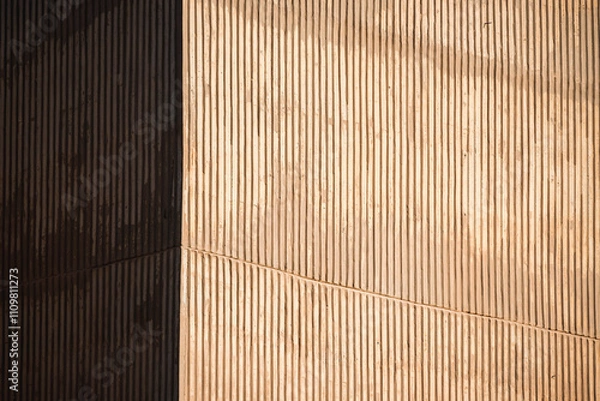 Fototapeta Texture of a building wall illuminated by the afternoon sun