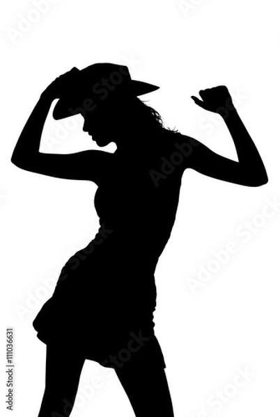 Fototapeta silhouette of a cowgirl dancing and posing
