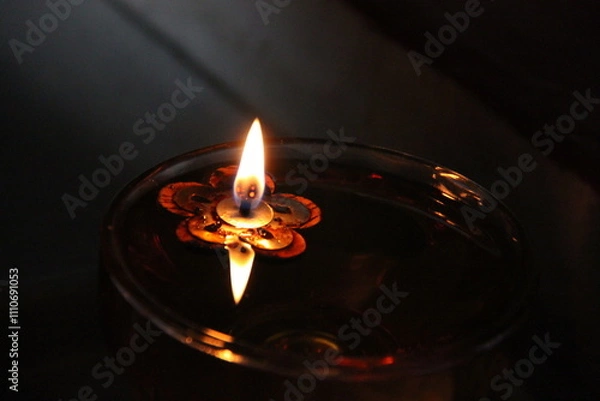 Obraz Candle light in the dark, close-up, shallow depth of field