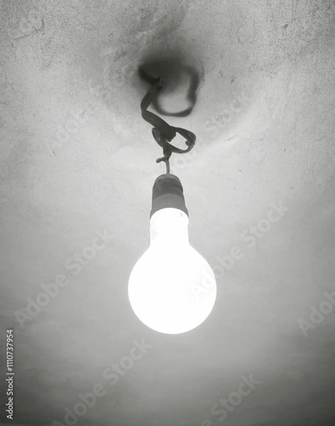 Fototapeta A sleek LED lamp in black and white, creating a modern and stylish ambiance with its minimalist design and striking contrast.
