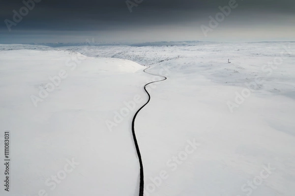 Obraz Winding Road Through Snowy Landscape