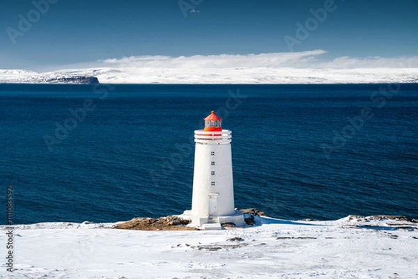 Obraz Lighthouse on Snowy Coastline