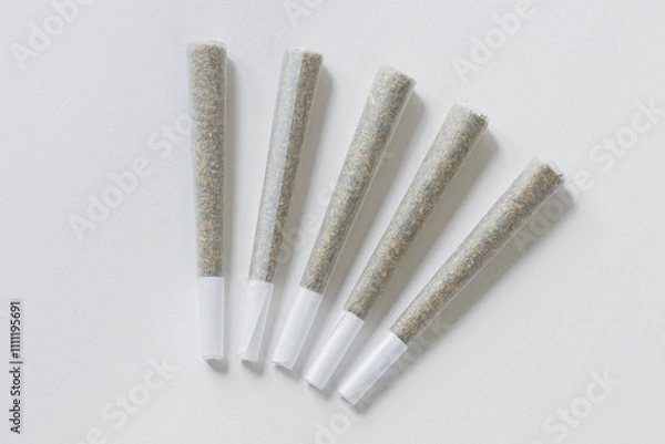 Obraz Clean overhead photo of Four Marijuana Joints on white background