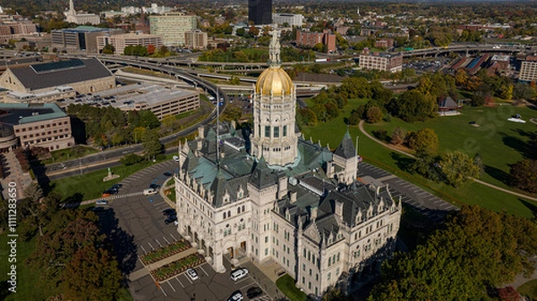 Fototapeta OCTOBER 19, 2022, HARTFORD, CT, USA - aerial view of stunning CT Capitol in downtown Hartford
