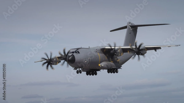 Fototapeta Miltary transport aircraft in flight