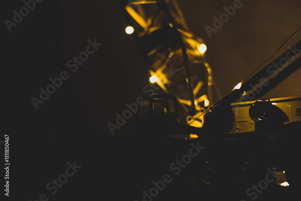 Obraz Big boom crane with light lights in the dark