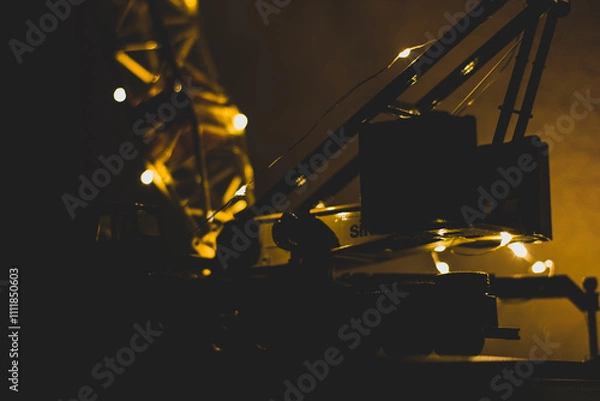 Obraz Big boom crane with light lights in the dark