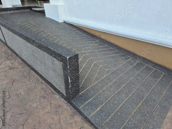 Fototapeta Wheelchair ramp, inclined plane was installs in all building to make a convenience for handicap people. 
Standard construction building must have inclined slope.