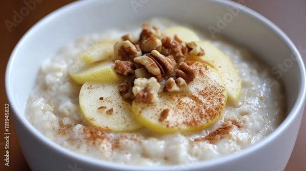 Fototapeta Delicious Apple Cinnamon Oatmeal with Walnuts: A Wholesome Breakfast Bowl