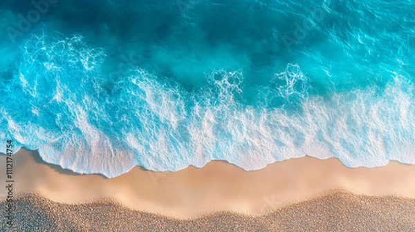 Fototapeta Ocean waves on the beach as a background. Aerial top down view.