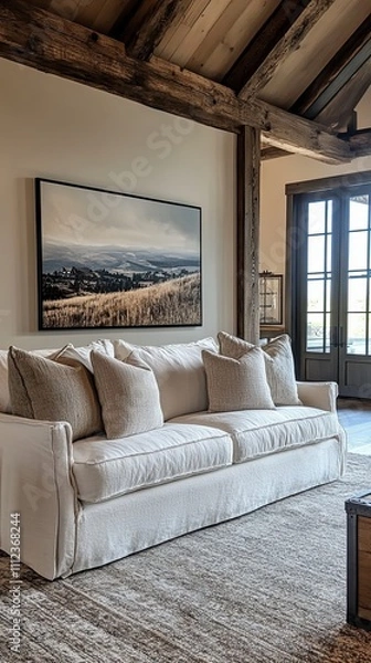 Obraz Rustic Living Room Featuring Comfortable Sofa and Landscape Art