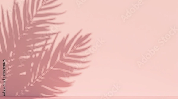 Obraz Tropical elegance: soft shadows of palm leaves on a delicate pink background. Stylish background is perfect for website design, cosmetics advertising, fashion blogs, postcards.