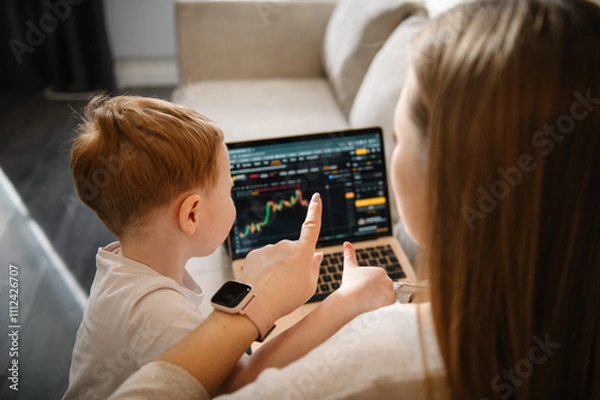 Fototapeta Selling ether, bitcoin or altcoin. Work cryptocurrency market chart on laptop monitor screen. Kid make noise and disturb woman working talking on phone. Mom work on laptop from home with child.