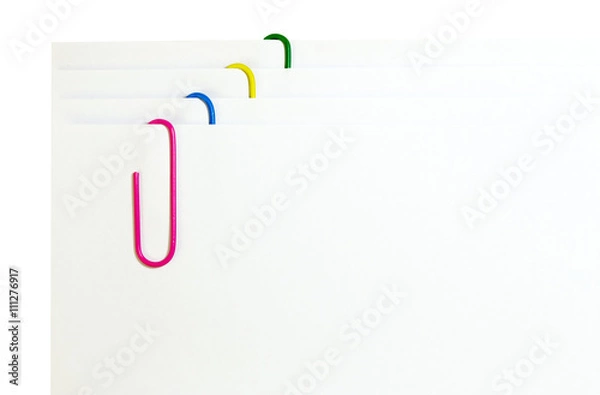 Obraz white paper with colored paper clips