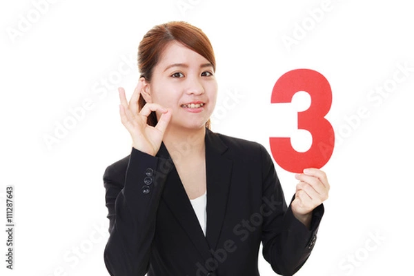 Obraz 数字を持つ笑顔の女性