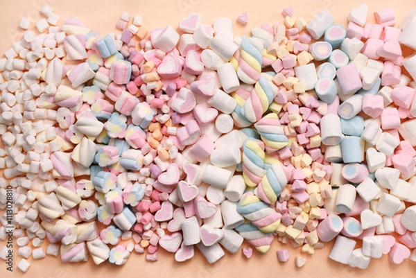 Fototapeta Confectionery and sweeties varieties background: light pink and white marshmallows, sugar confetti, bonbon and candies