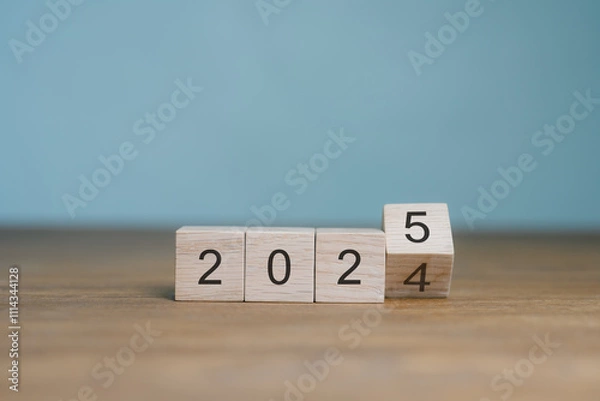 Fototapeta 2024 Business and customer review for next year's business strategy planning 2025 Flip of 2024 2025 on wooden blocks. End-of-year business ideas.