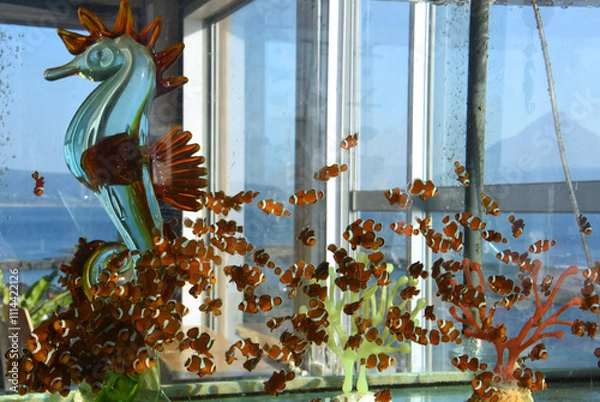 Obraz 鹿児島県タツノオトシゴハウスの竜の落とし子と置物と開聞岳