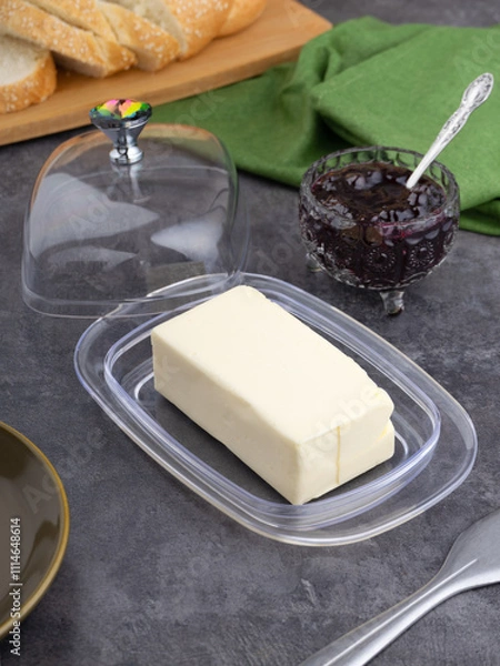 Obraz Dish with block of tasty butter