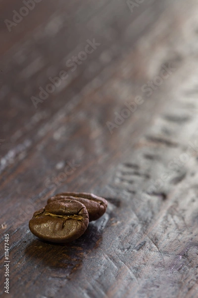 Obraz Coffee beans on wood background