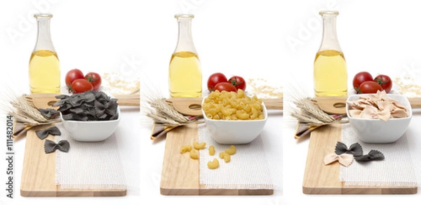 Fototapeta Products on the table, food for cooking Italian noodles and pasta - a variety of cereals, eggs, olive oil, fresh tomatoes on a wooden Board on a white background. Vegetarian and meatless