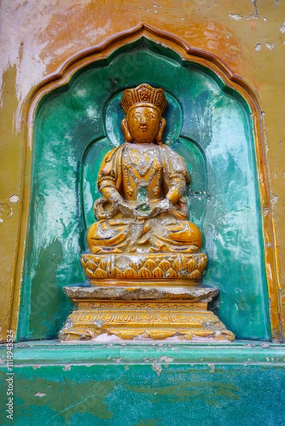Obraz glazed Buddha on the wall of the Wisdom-Sea Temple, The Liangless Buddha Temple at the top of Wanshou Mountain in Summer Palace in Beijing.