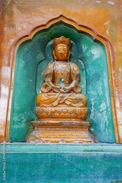 Obraz glazed Buddha on the wall of the Wisdom-Sea Temple, The Liangless Buddha Temple at the top of Wanshou Mountain in Summer Palace in Beijing.