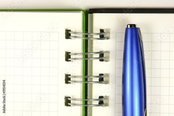 Obraz Notebook and a pen closeup photo