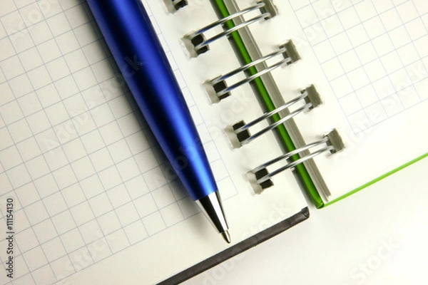 Fototapeta Notebook and a pen closeup