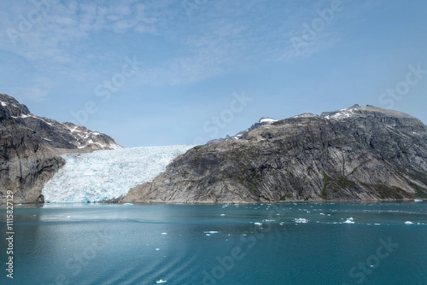 Fototapeta Prins Christian Sund Greenland mountain fjord with floating ice and shore iceberg on a summer day