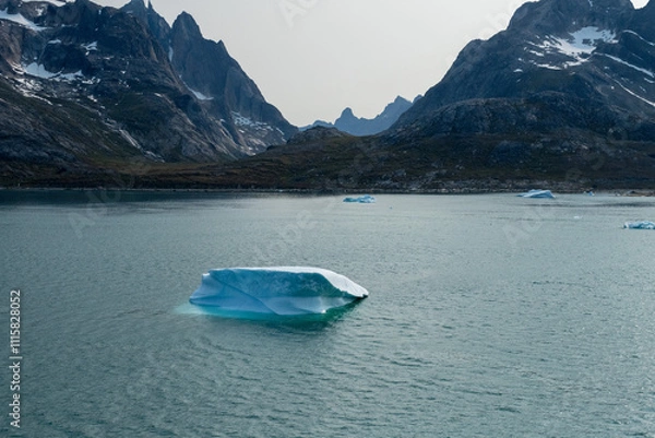 Fototapeta Prins Christian Sund Greenland mountain fjord with floating ice and shore iceberg on a summer day