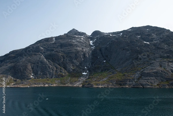 Fototapeta Prins Christian Sund Greenland mountain fjord with floating ice and shore iceberg on a summer day