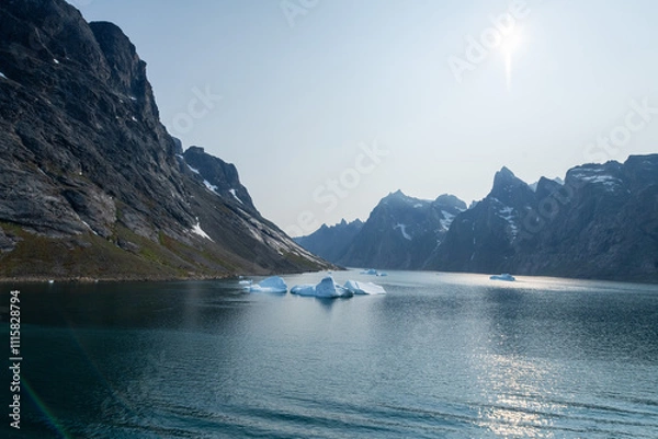 Fototapeta Prins Christian Sund Greenland mountain fjord with floating ice and shore iceberg on a summer day