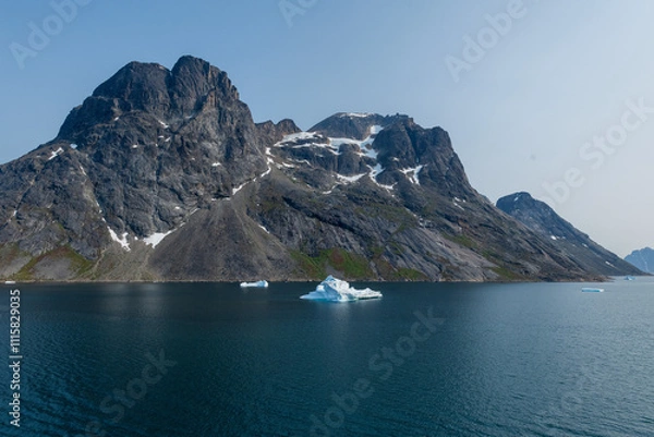 Fototapeta Prins Christian Sund Greenland mountain fjord with floating ice and shore iceberg on a summer day