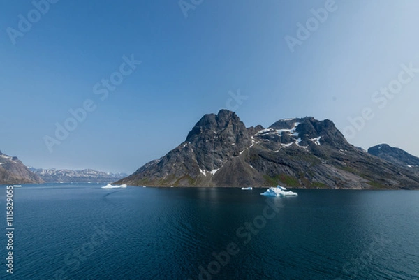 Fototapeta Prins Christian Sund Greenland mountain fjord with floating ice and shore iceberg on a summer day