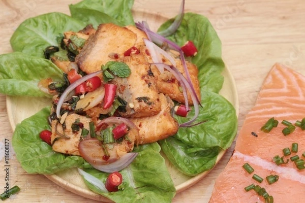 Fototapeta Spicy salmon salad delicious with raw salmon.