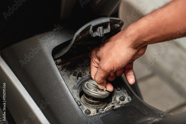 Obraz Filling Up a Motorcycle