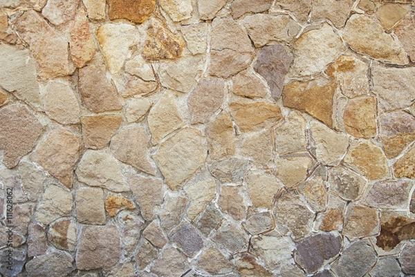 Obraz Old beige stone wall background texture