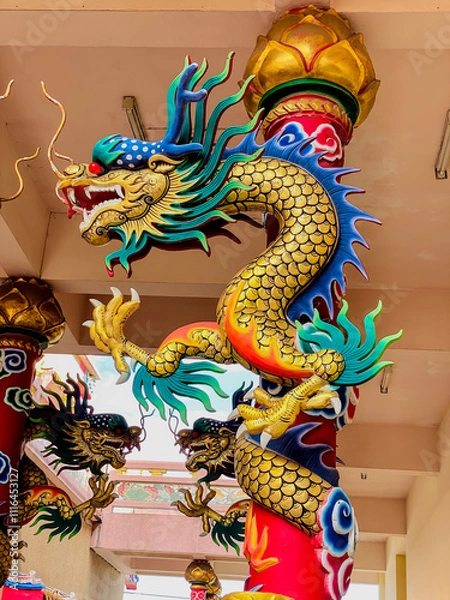 Fototapeta Dragon statue,dragon symbol,dragon Chinese is a beautiful Thai and Chinese architecture of shrine, temple.Symbol of good luck and prosperity during the Chinese New Year celebrations.