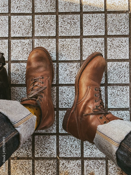 Fototapeta close up of a pair of boots