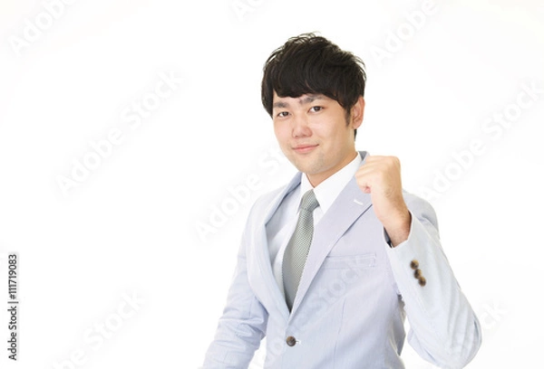 Fototapeta ガッツポーズのビジネスマン