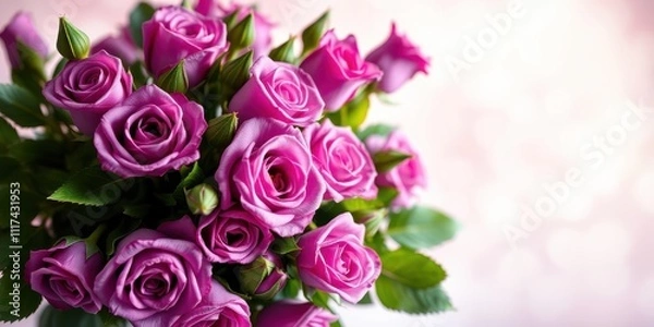 Fototapeta A Delicate Bouquet of Soft Pink Roses with Lush Green Foliage Against a Subtle Pink Background