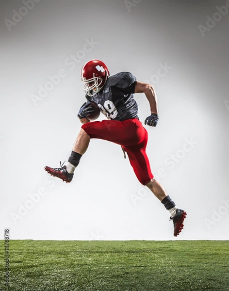 Fototapeta The american football player in action